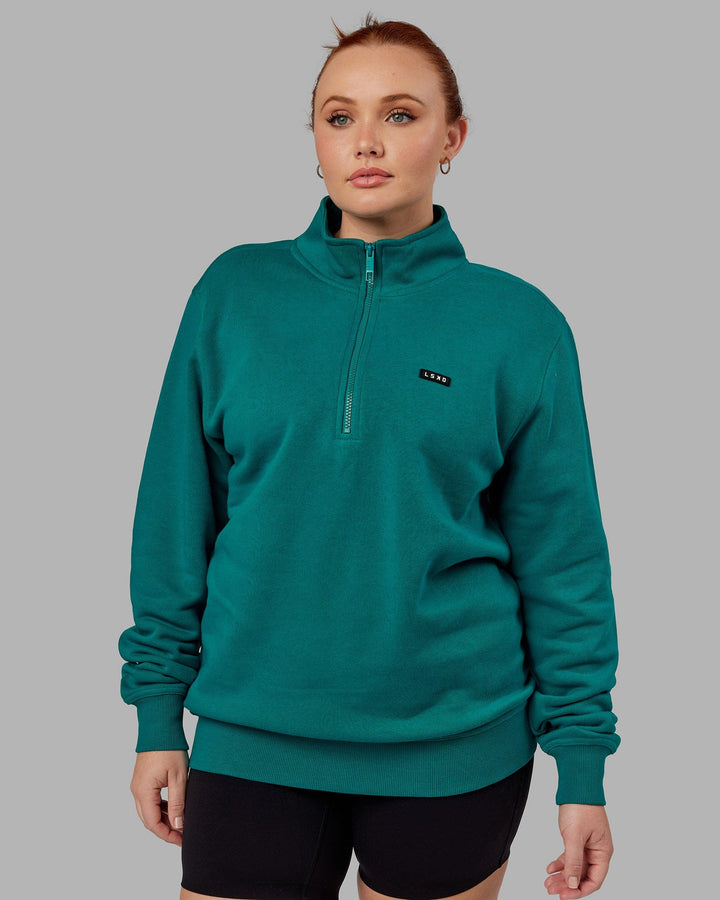 Woman wearing Unisex Fundamental 1/4 Zip Sweater - Deep Lake