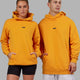 Woman wearing Unisex Fundamental Hoodie Oversize - Butterscotch