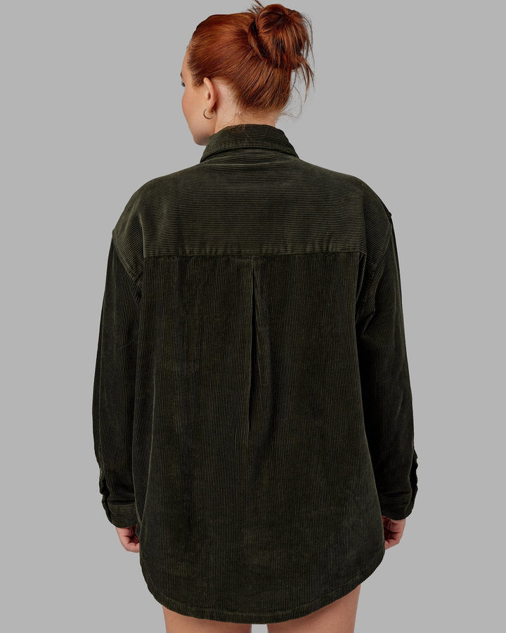 Woman wearing Unisex Iconic Cord Shacket - Forest Night