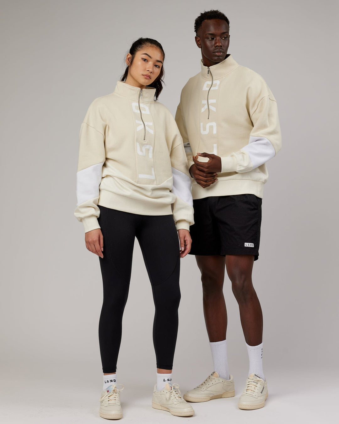 Woman and man wearing Unisex Inversion Sweater Oversize - Almond Milk