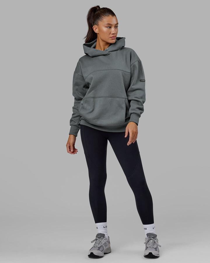 Woman wearing Unisex Lab Hoodie Oversize - Graphite