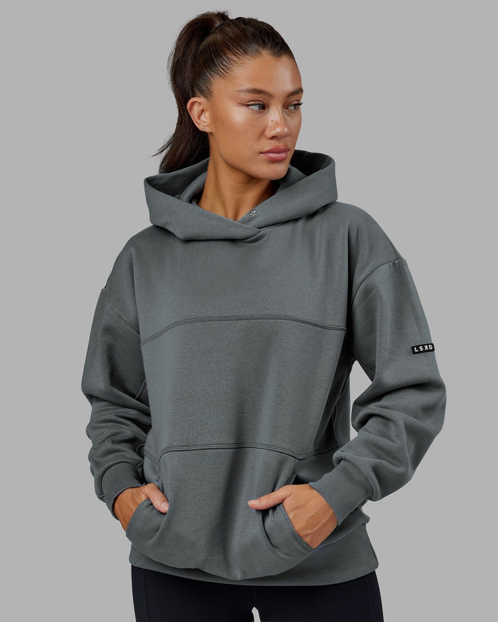 Woman wearing Unisex Lab Hoodie Oversize - Graphite