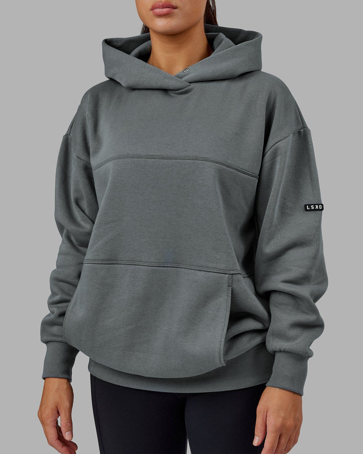 Woman wearing Unisex Lab Hoodie Oversize - Graphite