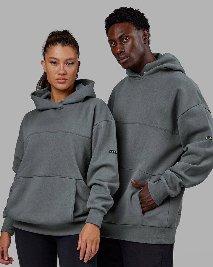 Woman wearing Unisex Lab Hoodie Oversize - Graphite