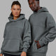 Woman wearing Unisex Lab Hoodie Oversize - Graphite
