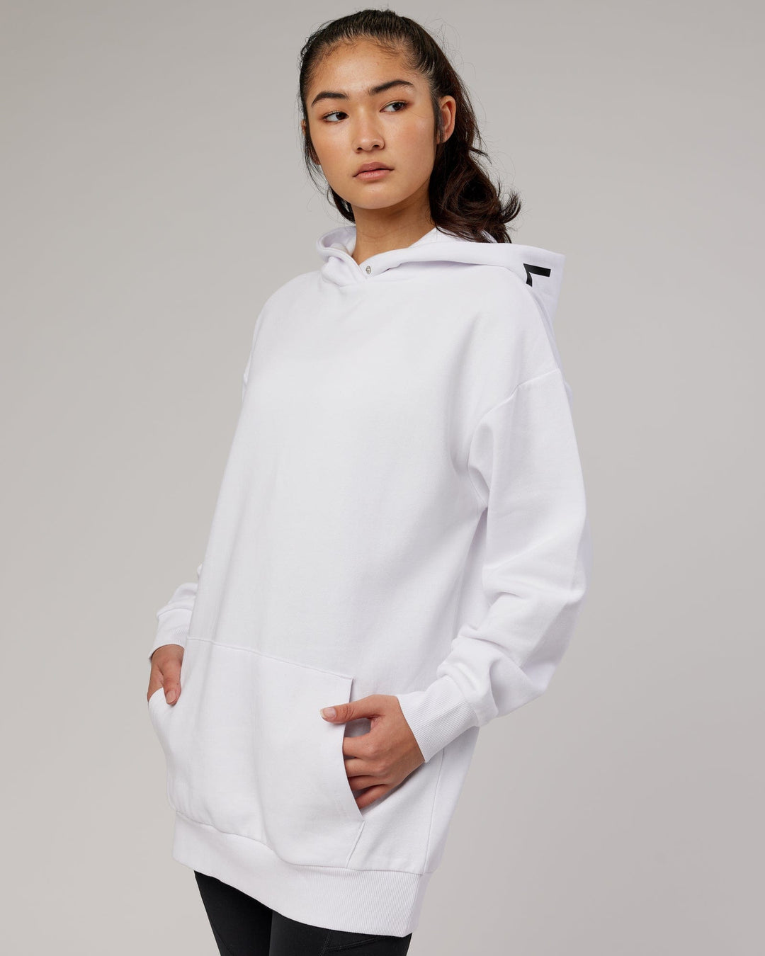 Woman wearing Unisex Linear Hoodie Oversize - White
