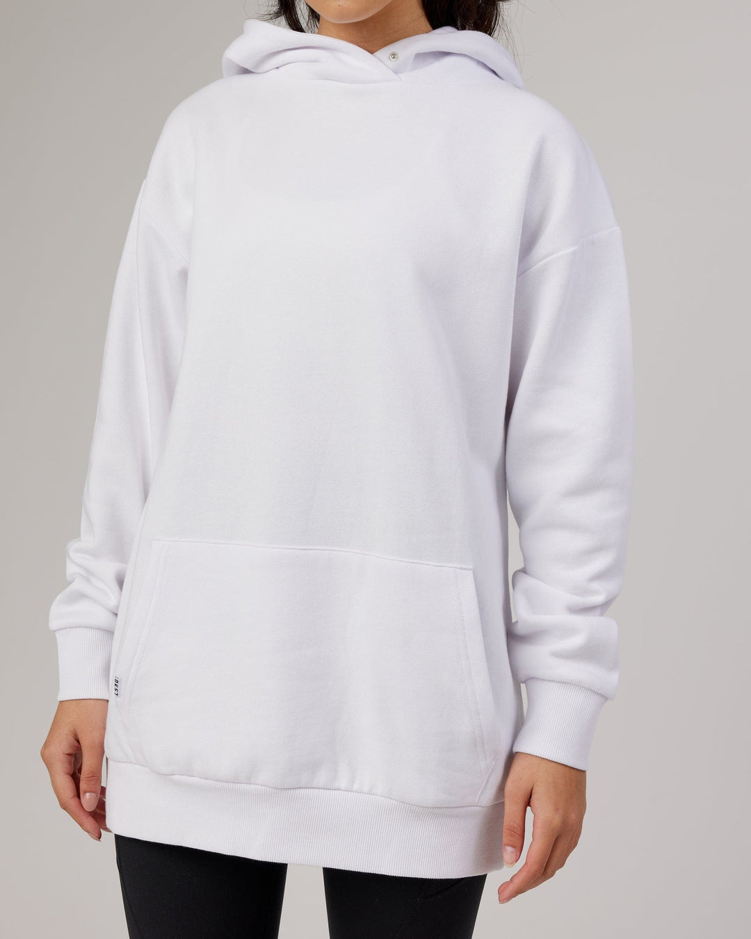 Woman wearing Unisex Linear Hoodie Oversize - White