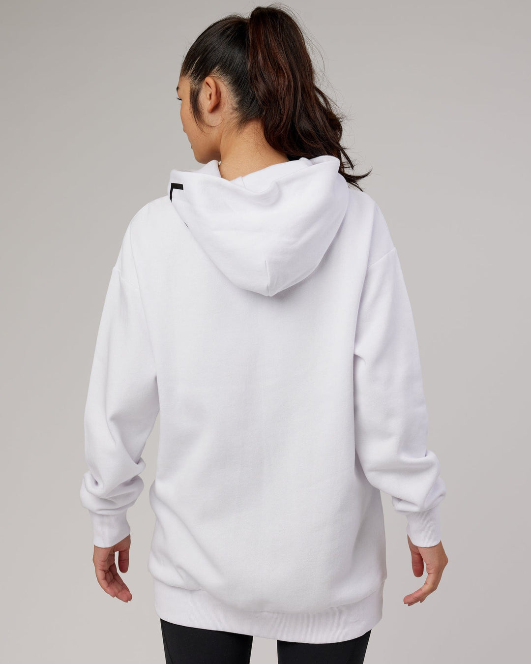 Woman wearing Unisex Linear Hoodie Oversize - White