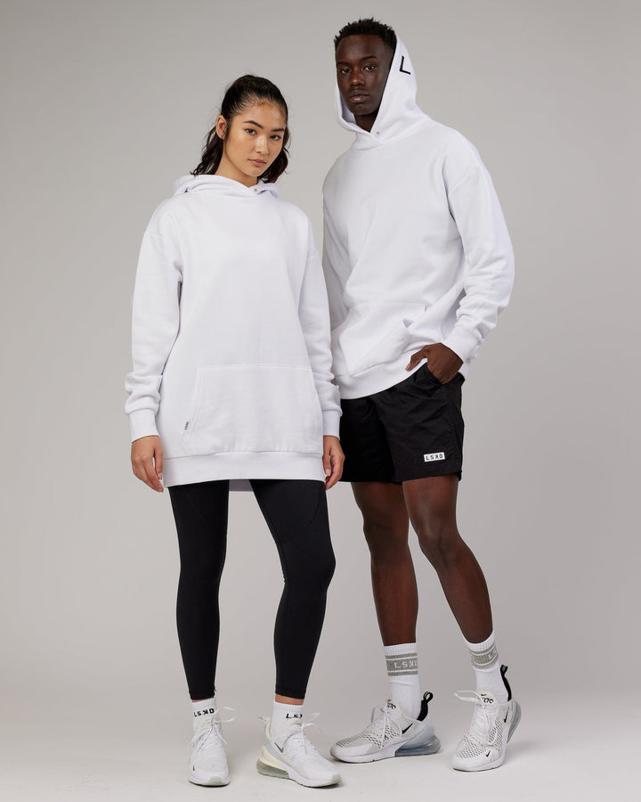 Woman and man wearing Unisex Linear Hoodie Oversize - White