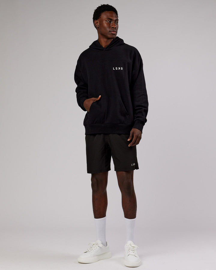 Man wearing Unisex Mode Hoodie Oversize - Black