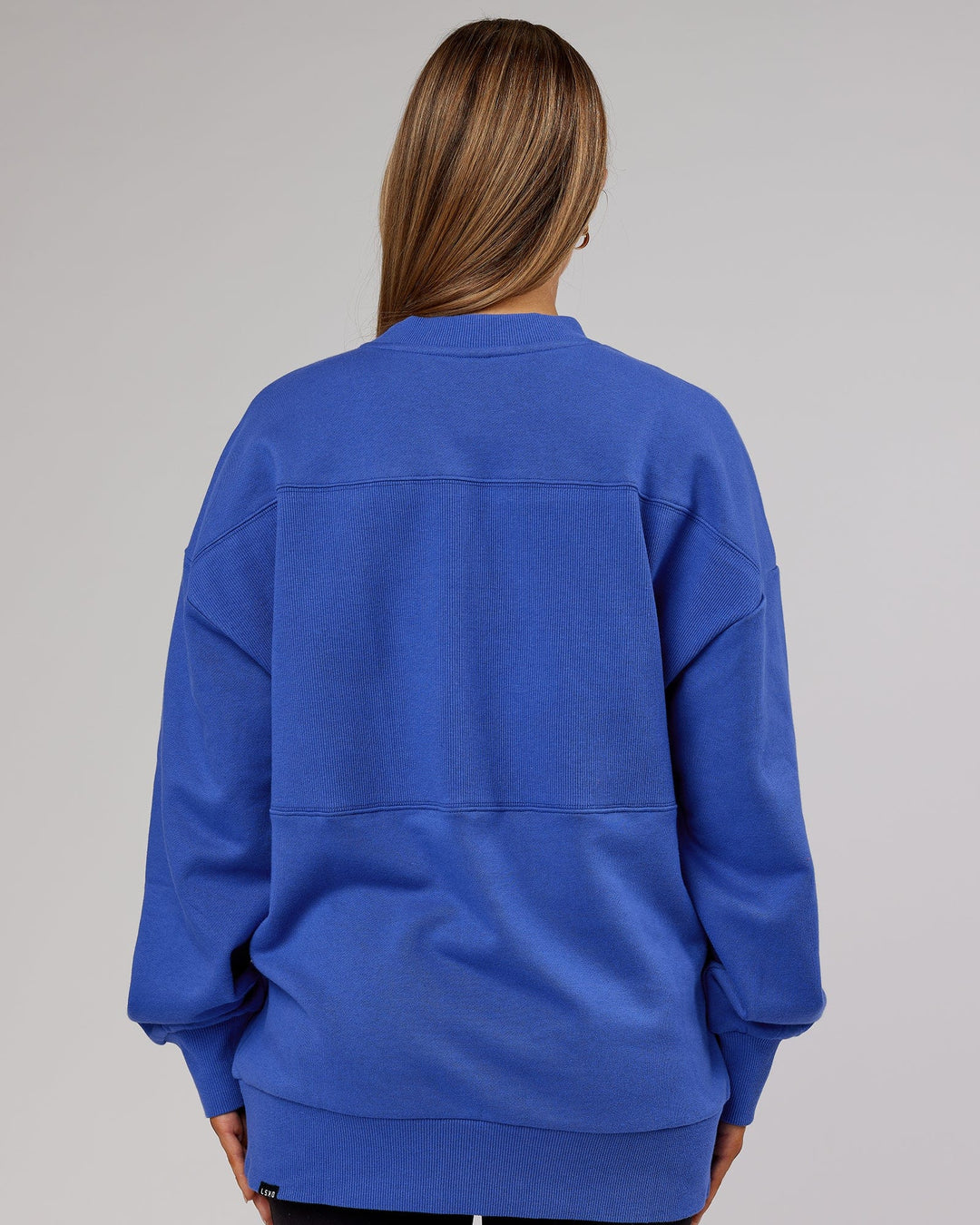 Woman wearing Unisex Off Duty Sweater Oversize - Power-Cobalt