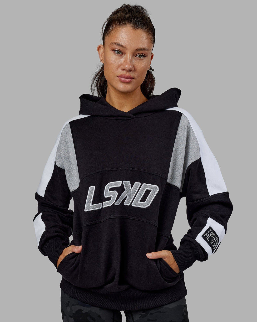 Woman wearing Unisex Slam Hoodie Oversize - Black-Lt Grey Marl