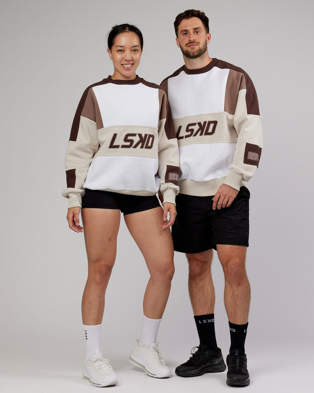 Woman wearing Unisex Slam and man Sweater Oversize - White-Deep Taupe