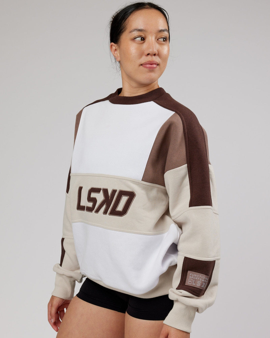 Woman wearing Unisex Slam Sweater Oversize - White-Deep Taupe