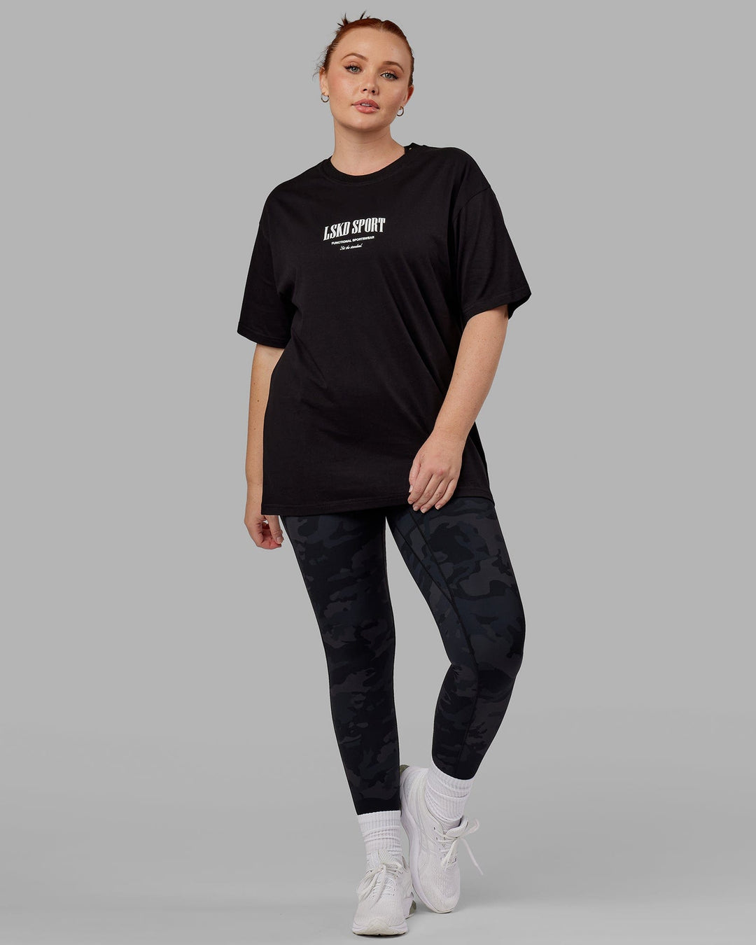 Woman wearing Unisex Standard Heavyweight Tee Oversize - Black-White