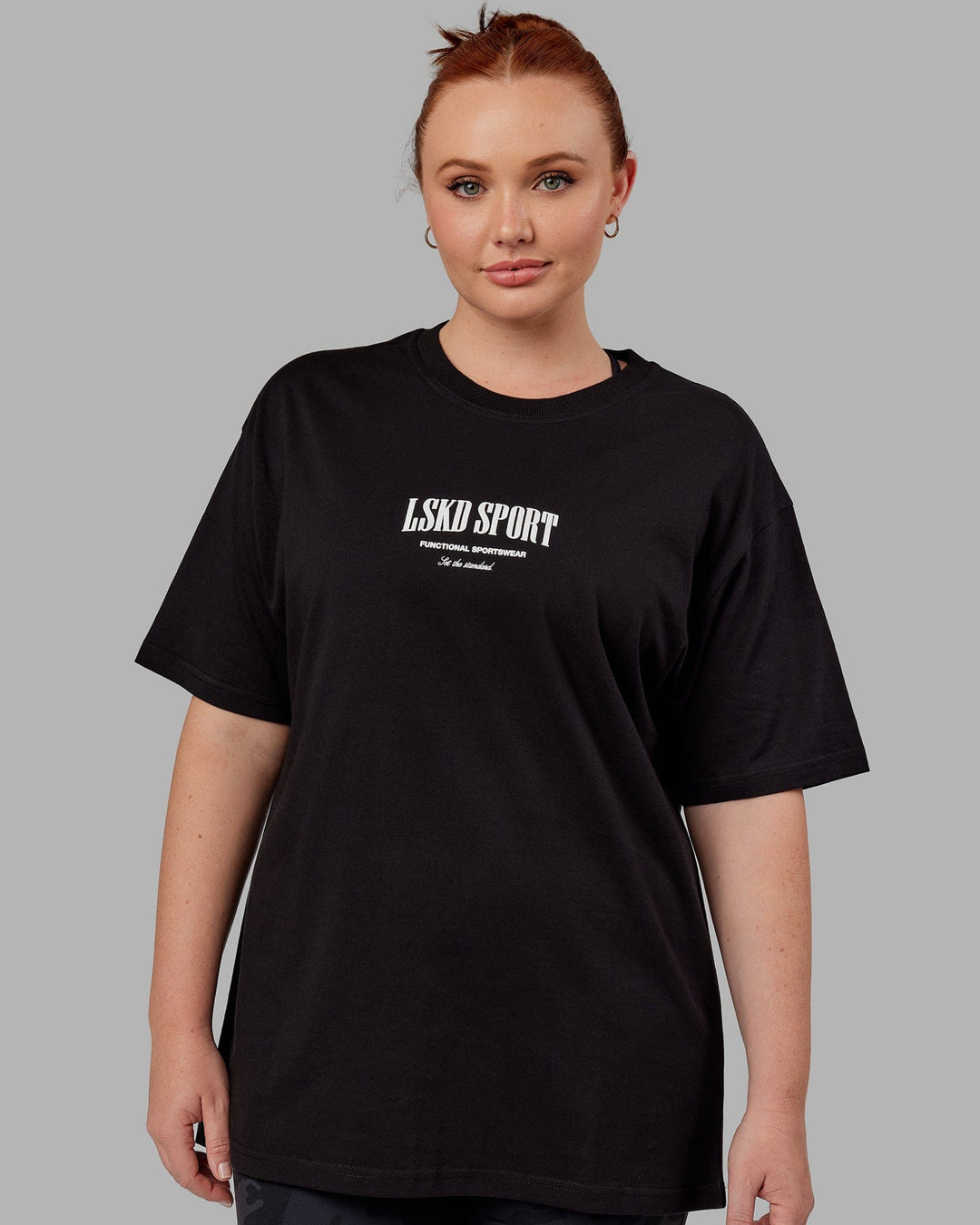 Woman wearing Unisex Standard Heavyweight Tee Oversize - Black-White