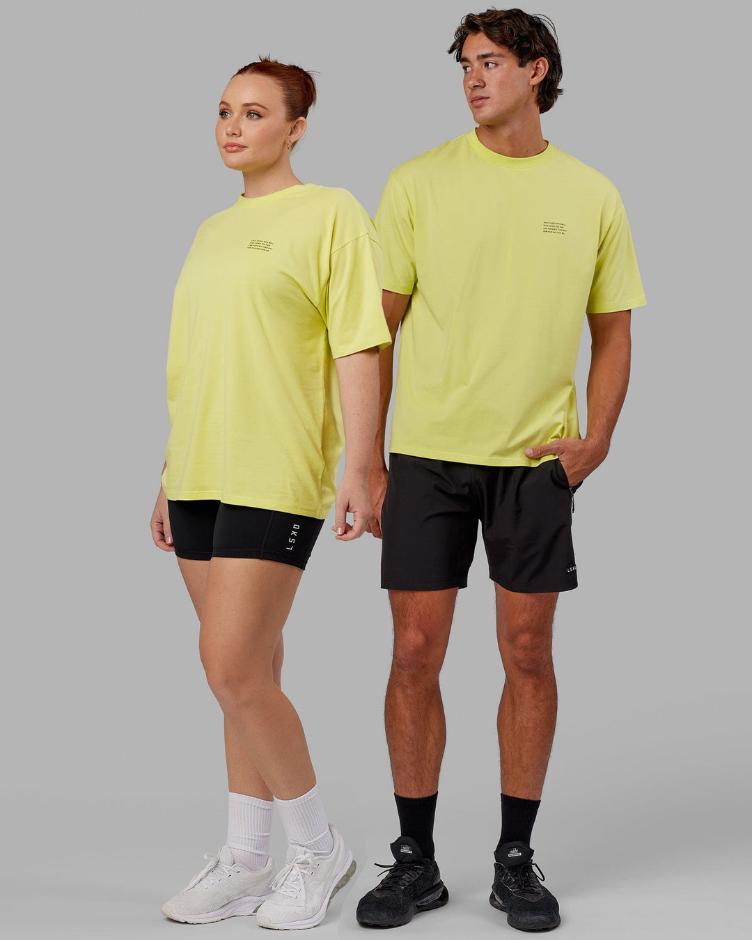 Duo wearing Unisex Strive FLXCotton Tee Oversize - Citrus Green
