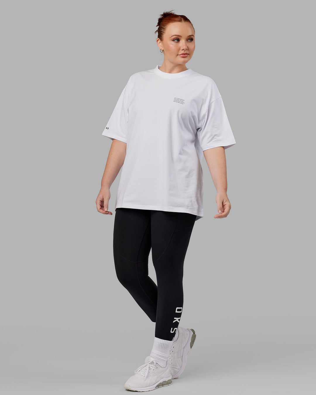 Woman wearing Unisex Strive FLXCotton Tee Oversize - White