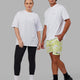 Duo wearing Unisex Strive FLXCotton Tee Oversize - White