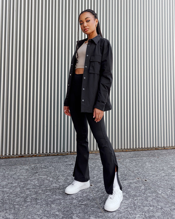 Woman wearing Unisex Utility Jacket - Black