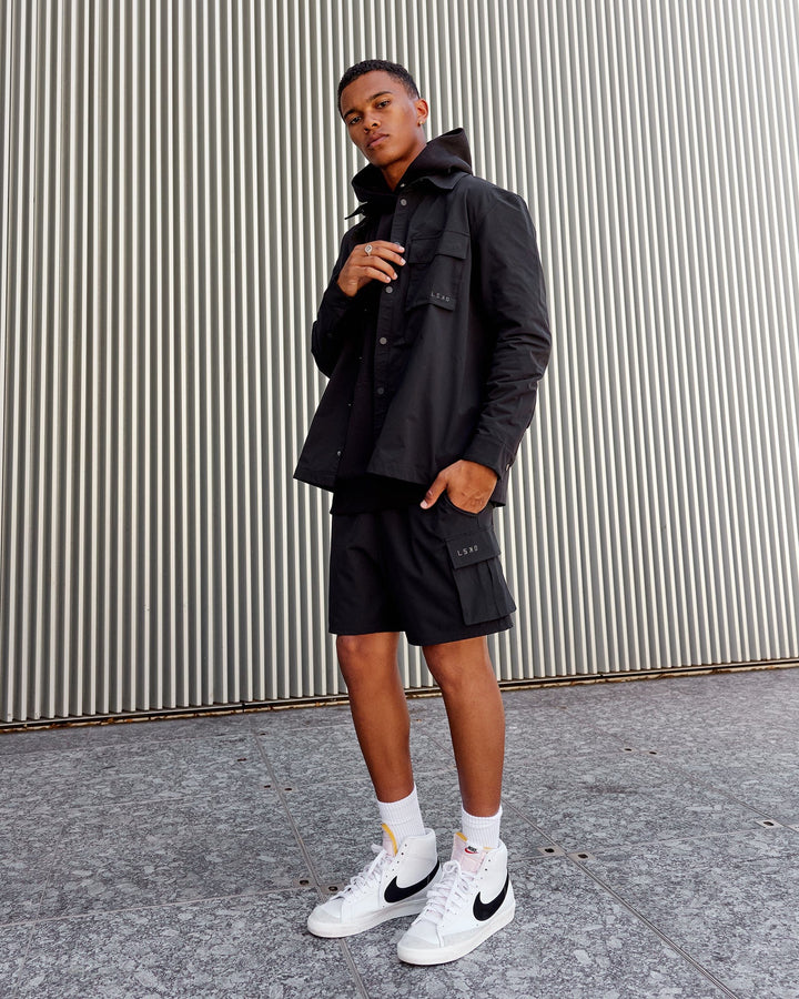 Man wearing Unisex Utility Jacket - Black