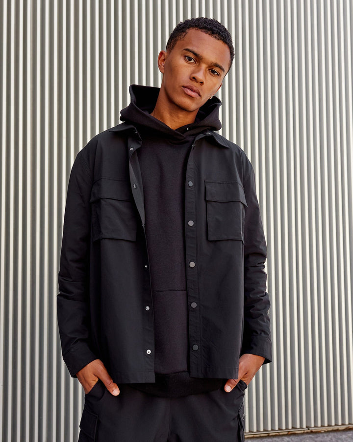 Man wearing Unisex Utility Jacket - Black