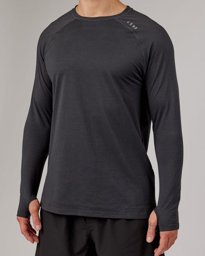 Man wearing Black Marl Perform VapourLFX Long Sleeve Tee