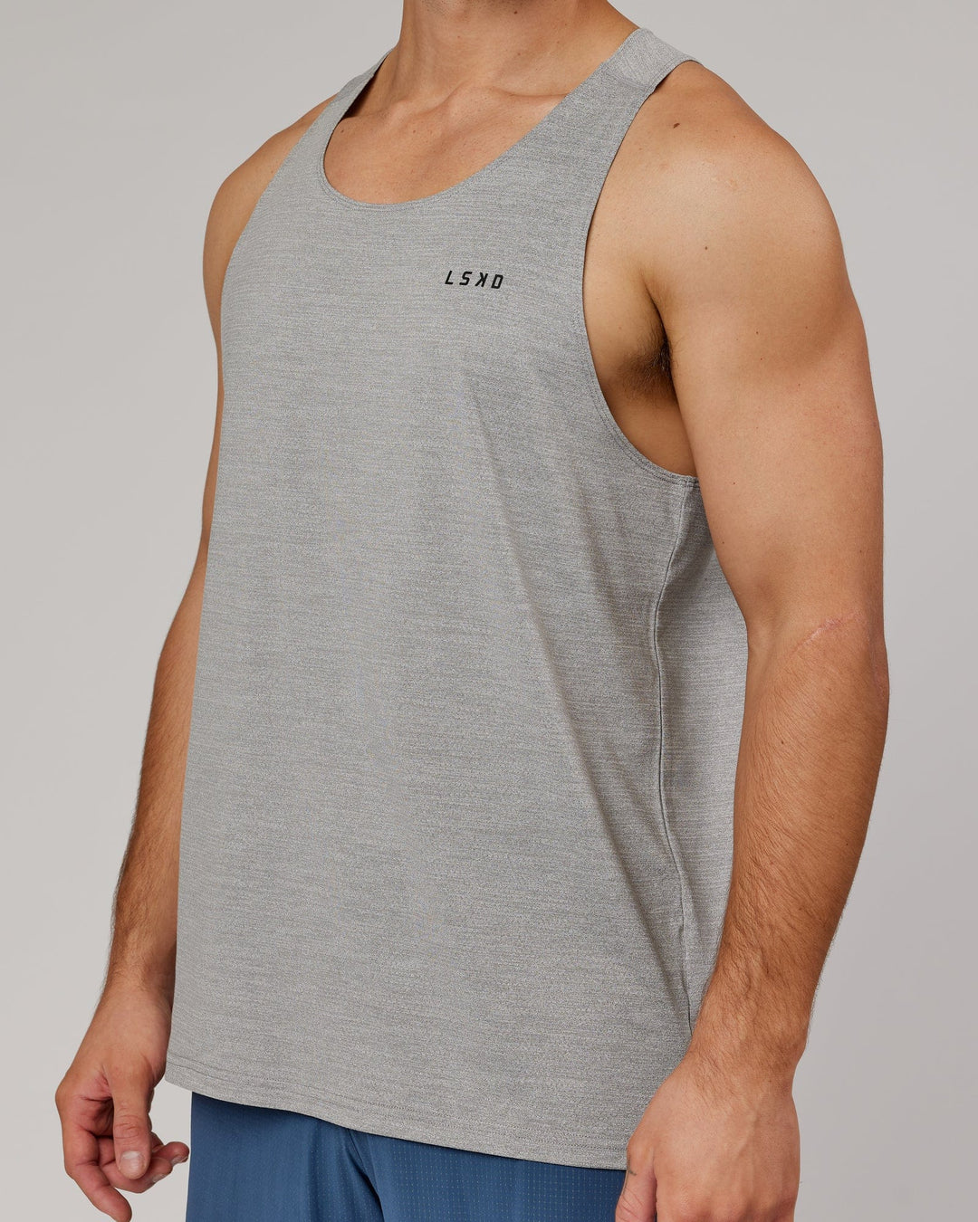 Man wearing Light Grey Marl Perform VapourLFX Tank