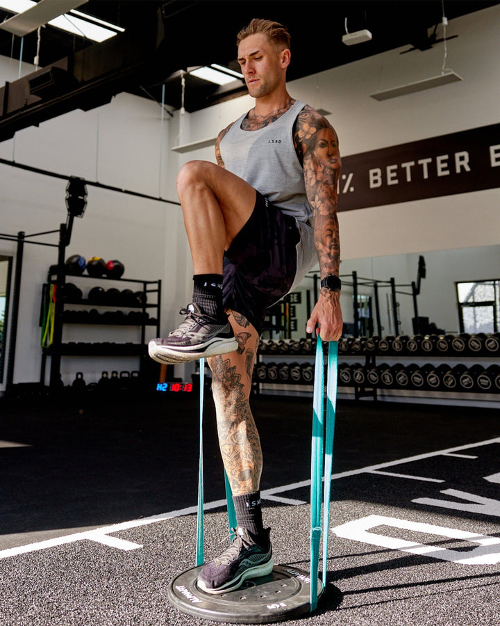 Man wearing Light Grey Marl Perform VapourLFX Tank