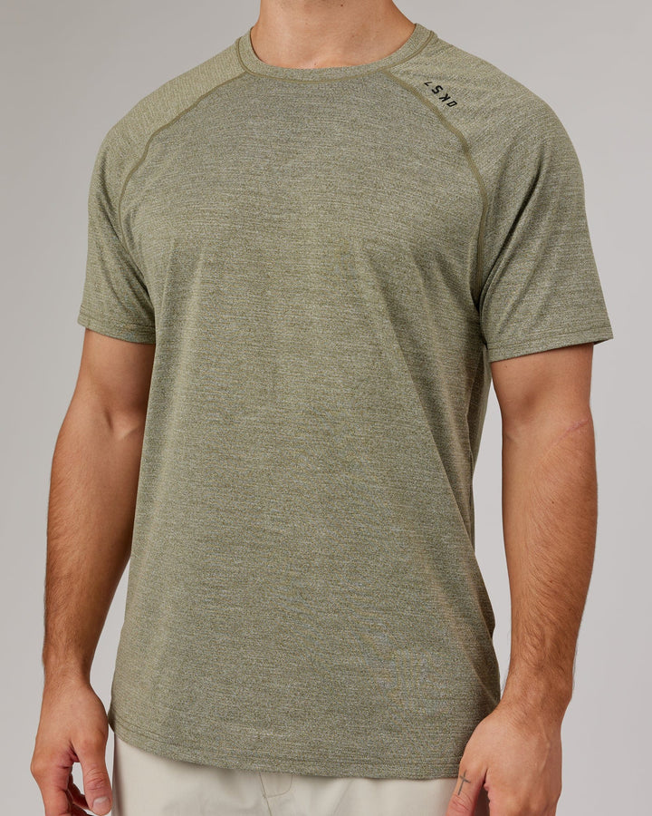 Man wearing Olive Marl Perform VapourLFX Tee