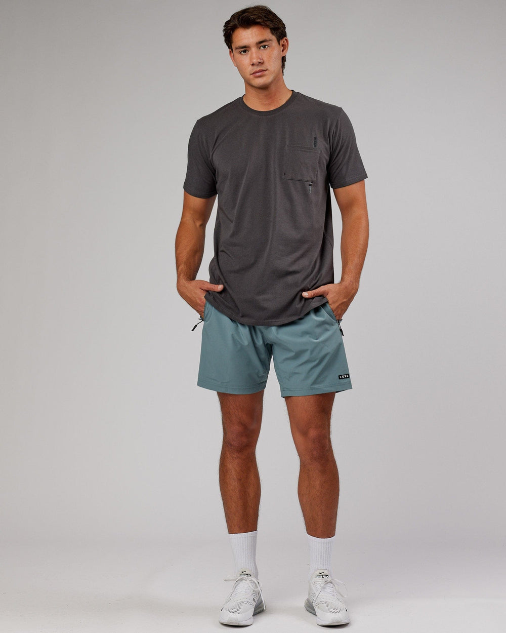 Man wearing Weld FLXCotton Pocket Tee - Asphalt