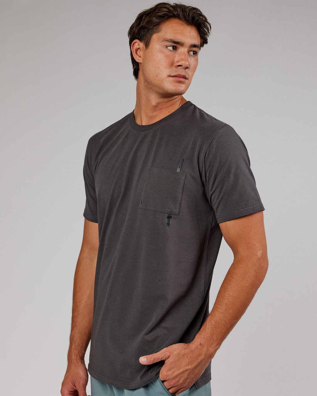 Man wearing Weld FLXCotton Pocket Tee - Asphalt