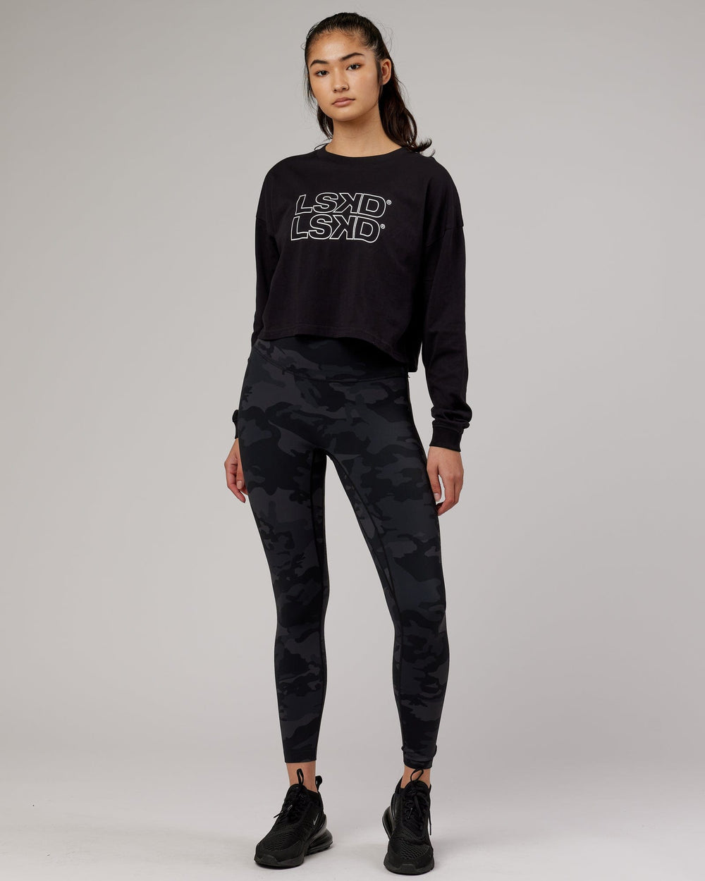 Woman wearing Flex LS Tee - Black