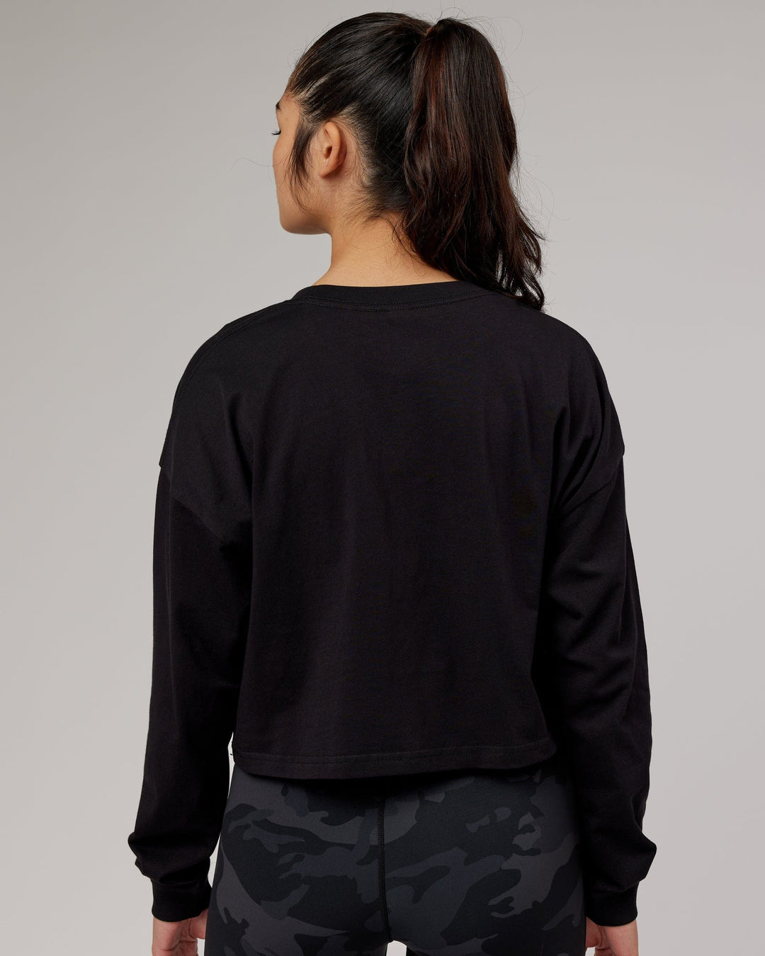 Woman wearing Flex LS Tee - Black