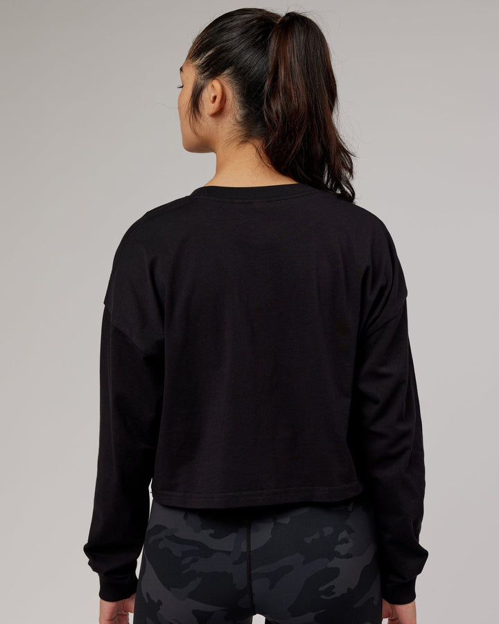 Woman wearing Flex LS Tee - Black