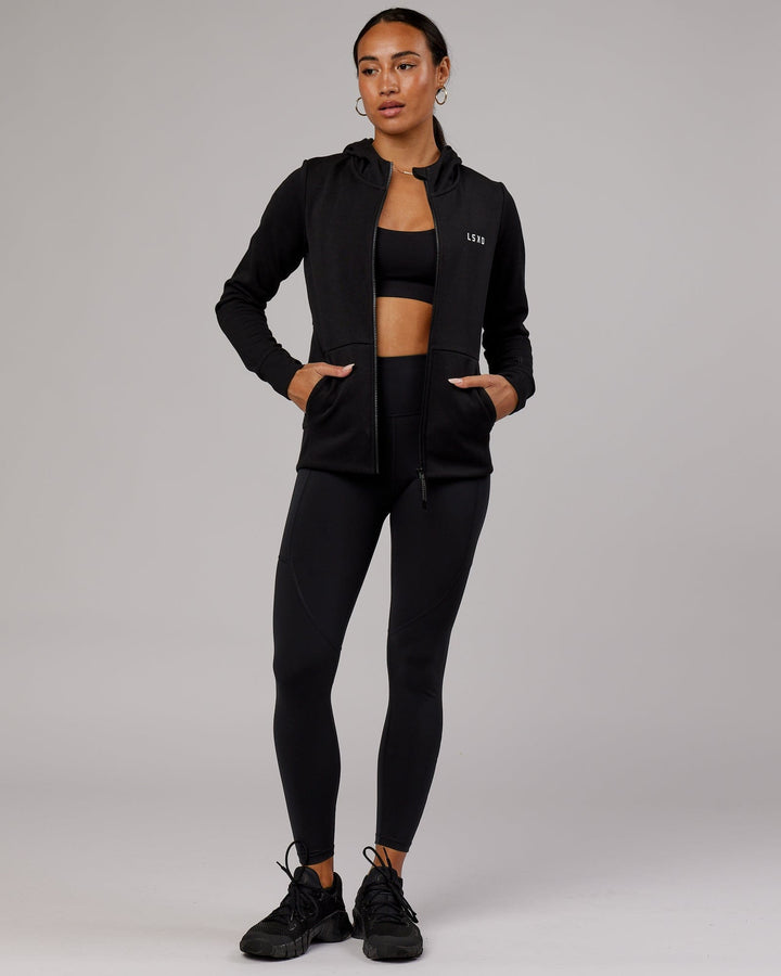 Wiman wearing Athlete ForgedFleece Zip Through Hoodie - Black