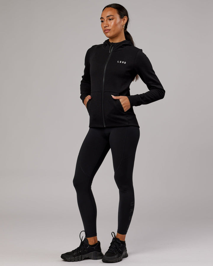 Wiman wearing Athlete ForgedFleece Zip Through Hoodie - Black