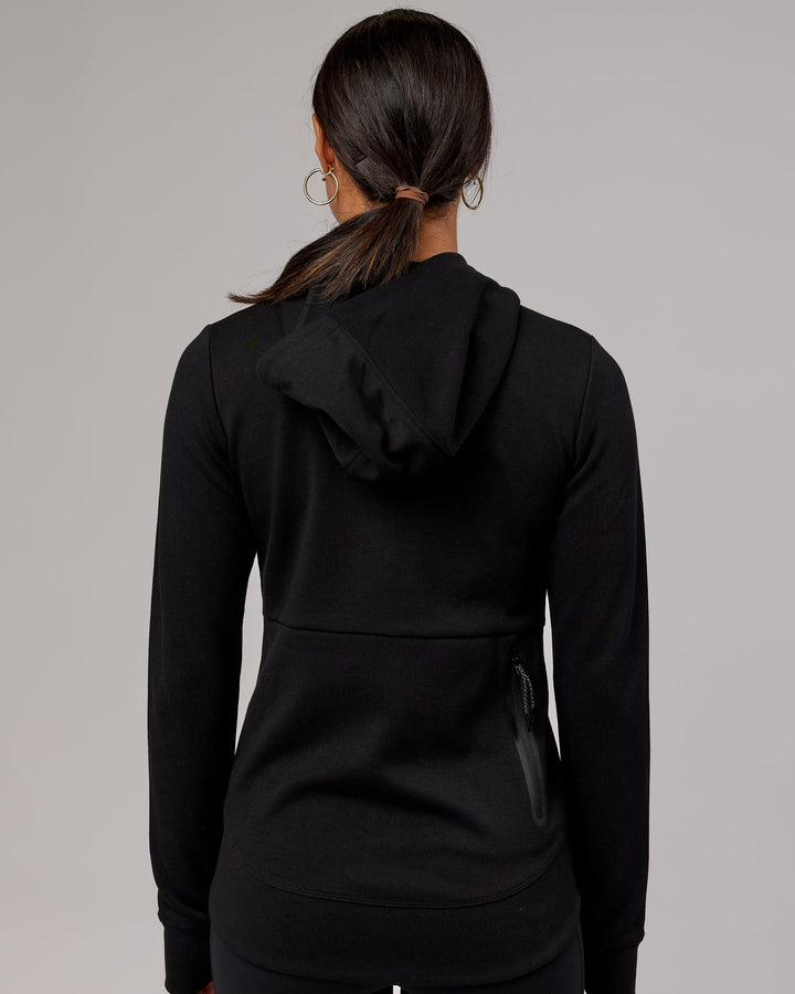 Wiman wearing Athlete ForgedFleece Zip Through Hoodie - Black