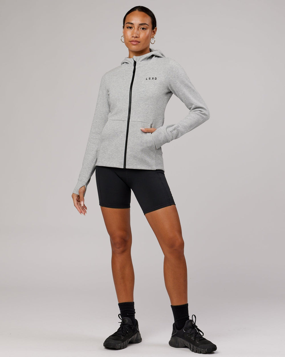 Woman wearing Athlete ForgedFleece Zip Through Hoodie - Lt Grey Marl