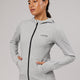 Woman wearing Athlete ForgedFleece Zip Through Hoodie - Lt Grey Marl