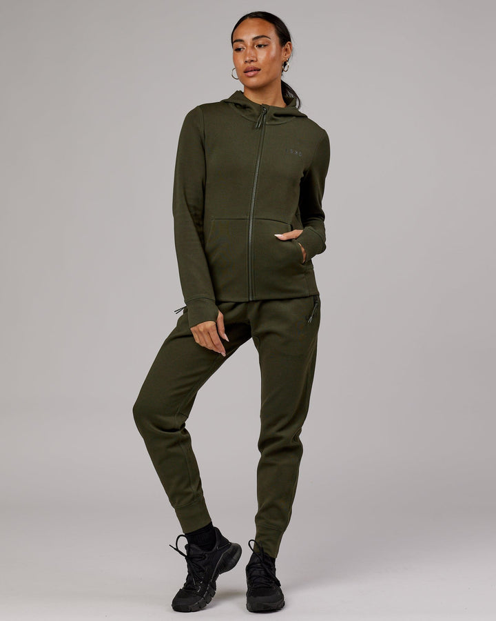 Woman wearing Athlete ForgedFleece Track Pant - Forest Night