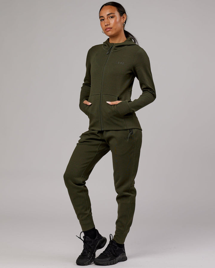 Woman wearing Athlete ForgedFleece Track Pant - Forest Night