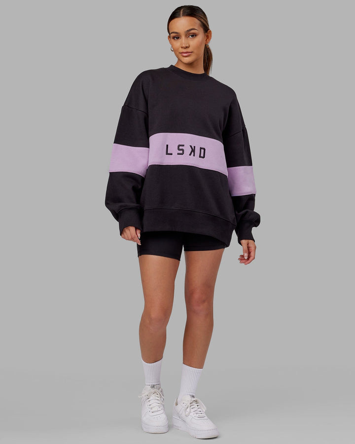 Woman wearing Unisex Extra Time Sweater Oversize - Black-Pale Lilac