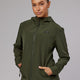 Woman wearing Womens Functional Training Jacket - Forest Night
