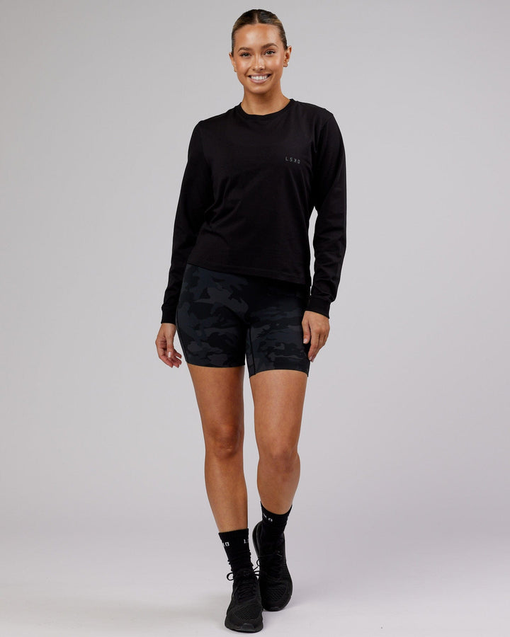 Woman wearing PimaFLX LS Tee - Black