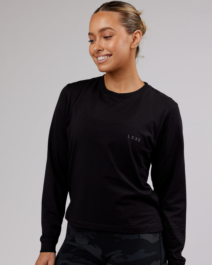 Woman wearing PimaFLX LS Tee - Black