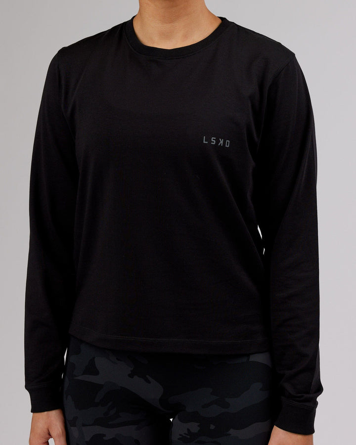 Woman wearing PimaFLX LS Tee - Black