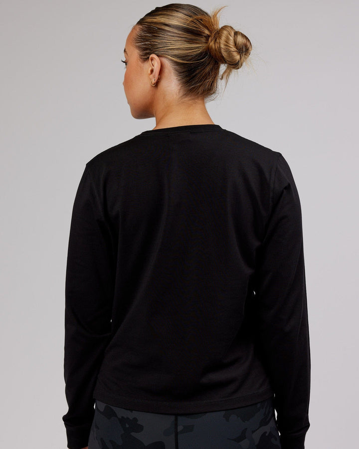 Woman wearing PimaFLX LS Tee - Black