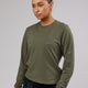 Woman wearing PimaFLX LS Tee - Olive Fade