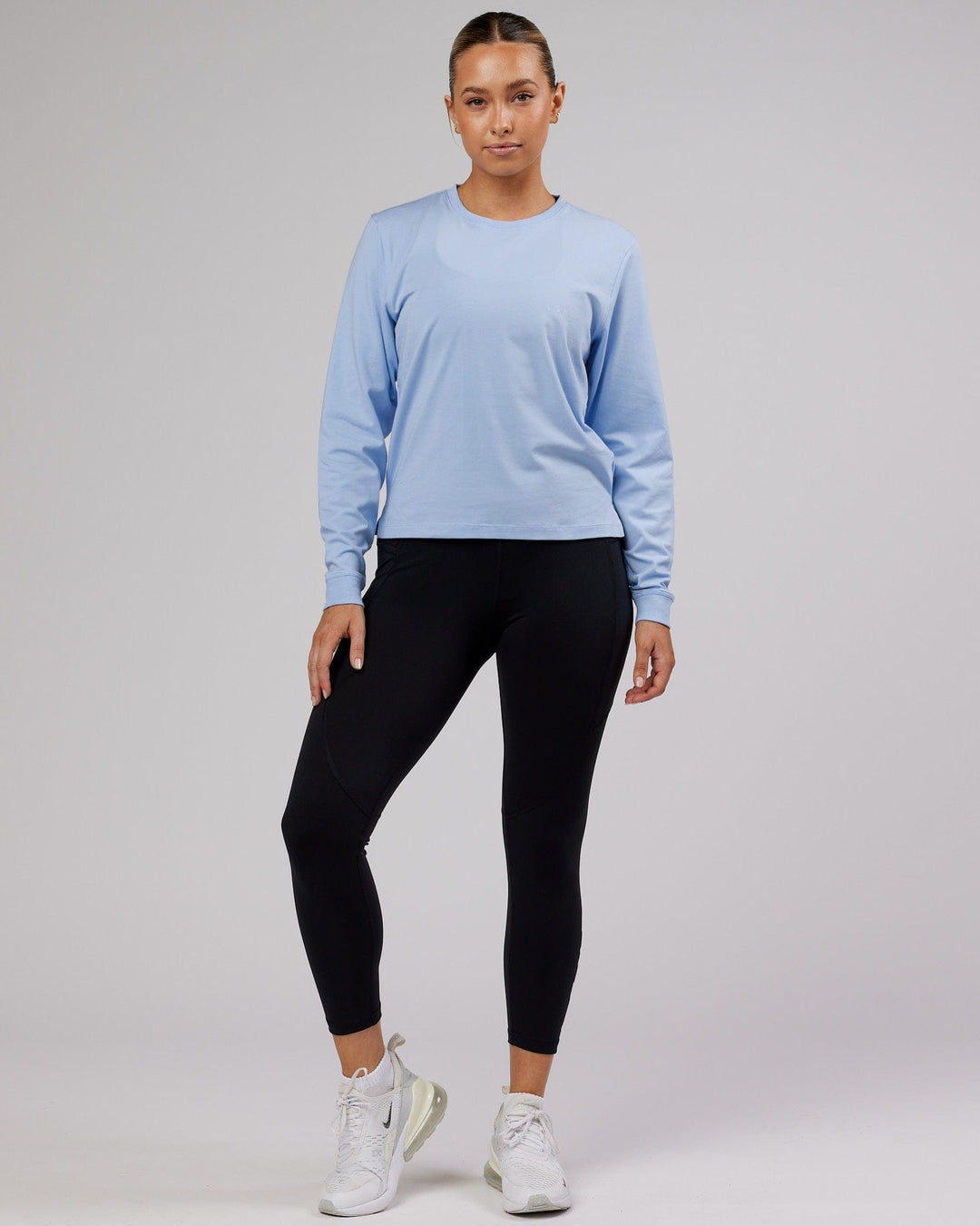 Woman wearing PimaFLX LS Tee - Windsurfer